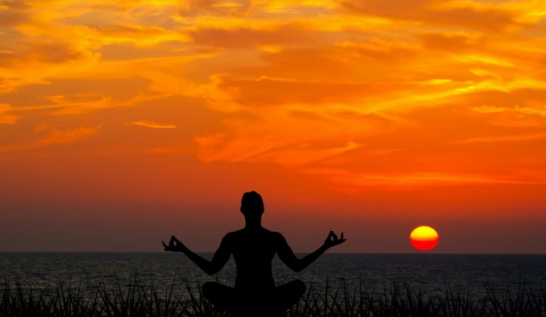 Meditating at sunset beautiful skies - Cornelius Counselling